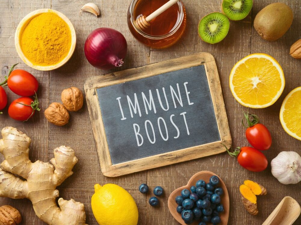 Fruits and vegetables for immune system boosting. Healthy eating background with copy space. Top view Fruits and vegetables for immune system boosting. Healthy eating background with copy space. Top view