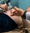 gynecologist-performing-ultrasound-consultation